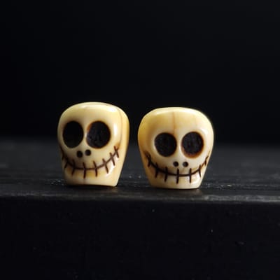 Ivory Skull beads 12mm